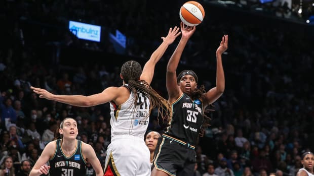 New York Liberty forward Jonquel Jones shoots over Las Vegas Aces center Kiah Stokes during the WNBA Finals.